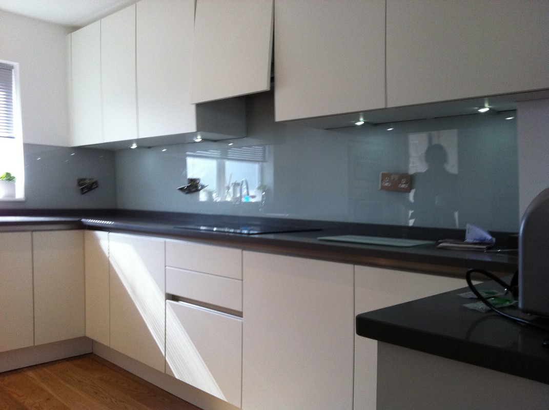 Grey glass kitchen splashback with LED lighting in Potters Bar