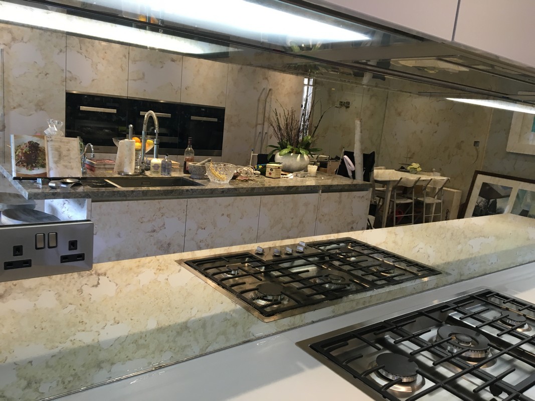 Mirror glass splashback in Potters Bar luxury kitchen