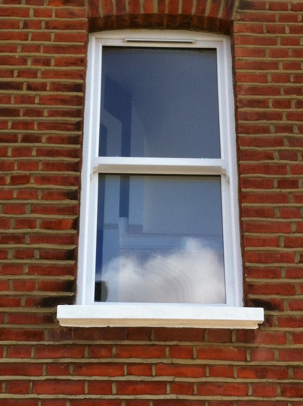 uPVC sash window on Victorian red brick house in Potters Bar